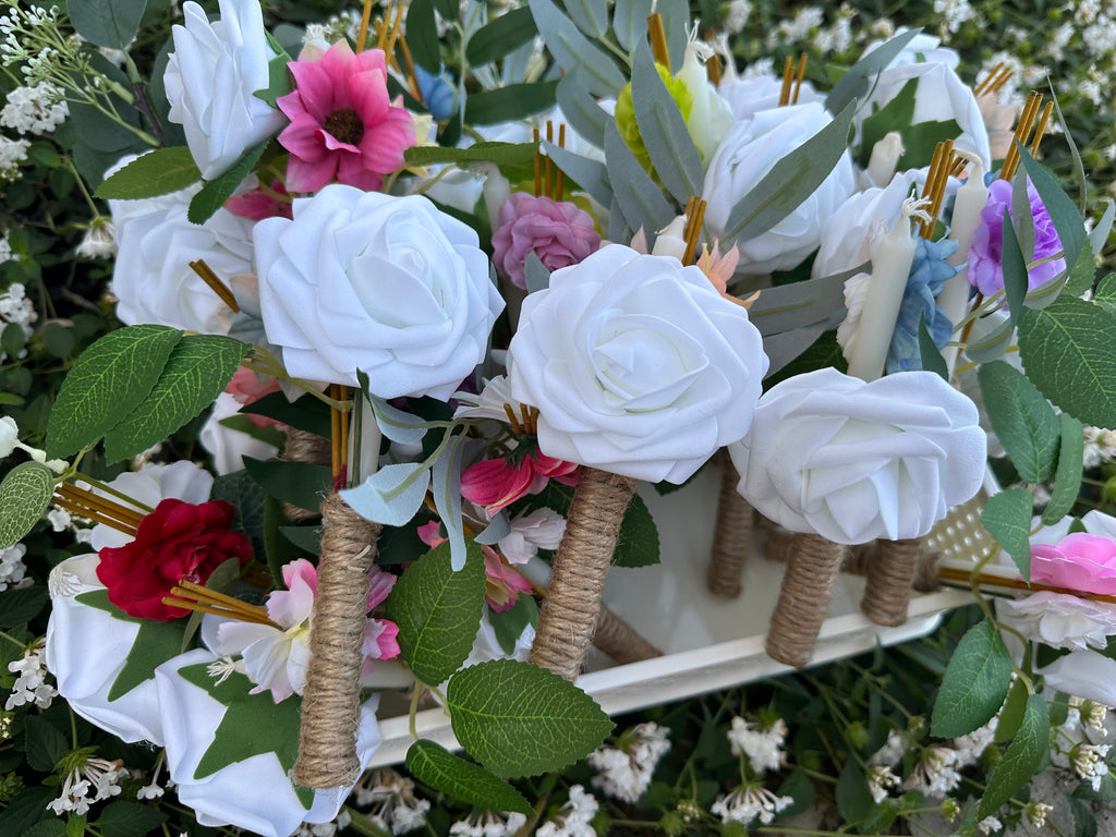 Traditional Cambodian funeral flower bundles with candle and incense. Set of 25 mixed-color offering sets, handmade to honor loved ones with Khmer traditions. $100 for set of 25